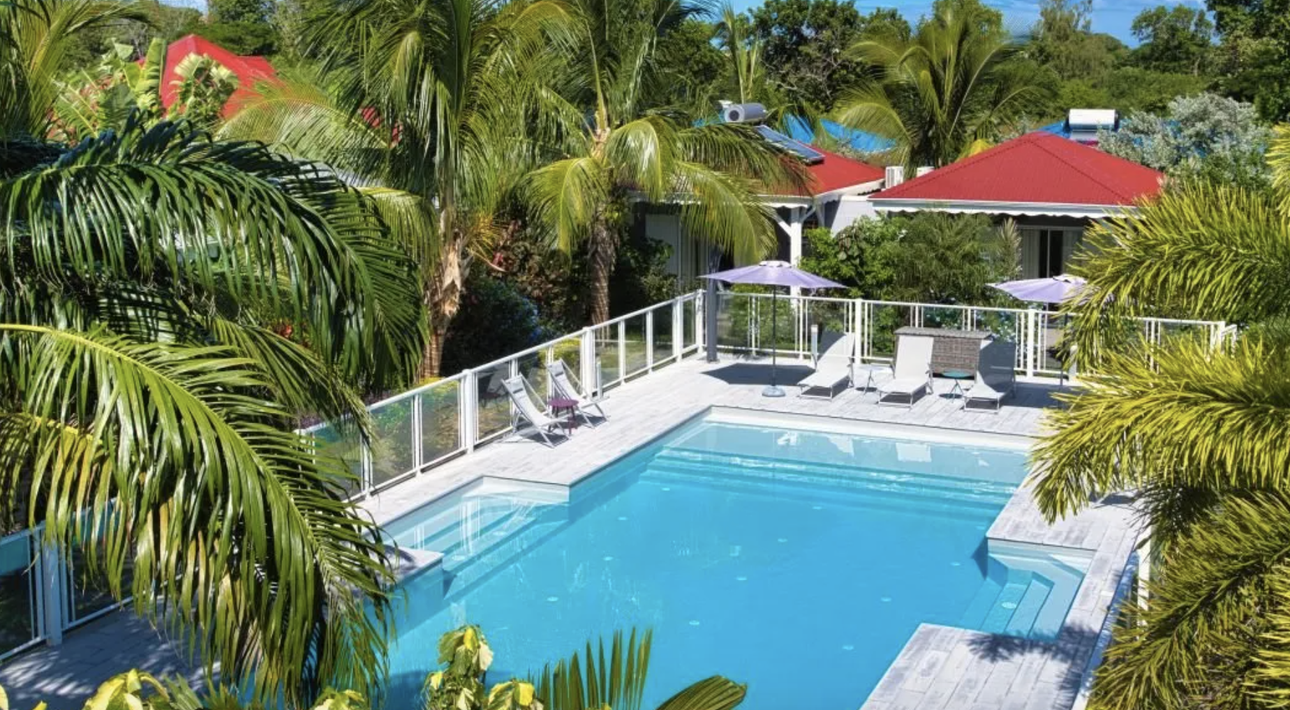 La piscine © Hôtel & Villa Le Cocotel